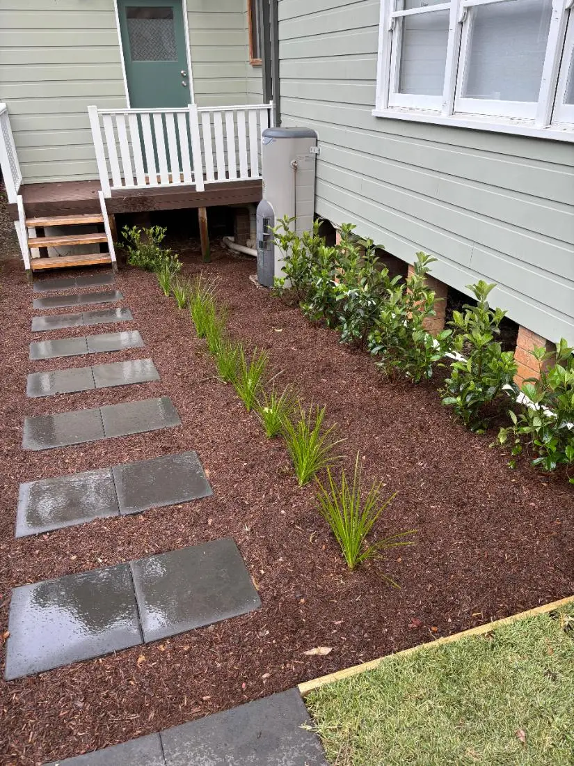 Garden Clean-ups by Status Gardens — freshly mulched beds and new plantings